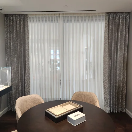 Commercial Consultation Room Drapery | Custom Fabric Creations, St. Petersburg, FL Layered patterned drapery and sheers in a commercial consultation room by Custom Fabric Creations, St. Petersburg, FL